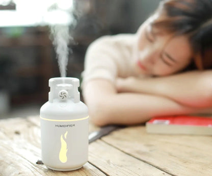 Multifunctional gas tank humidifier with USB connectivity in pink, blue, and white