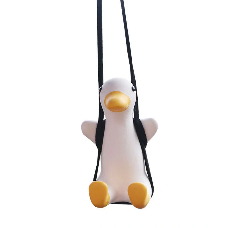 Car Swing Duck Ornament hanging from rearview mirror