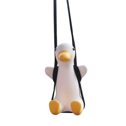 Car Swing Duck Ornament hanging from rearview mirror