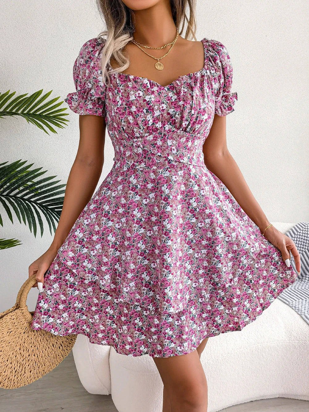 Stylish floral mini dress with A-line silhouette, high waist, and ruffled hem in various vibrant colors