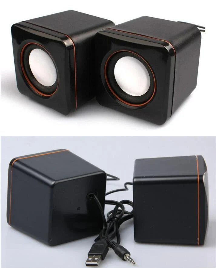 Compact USB-powered desktop speaker with sleek black design and volume control