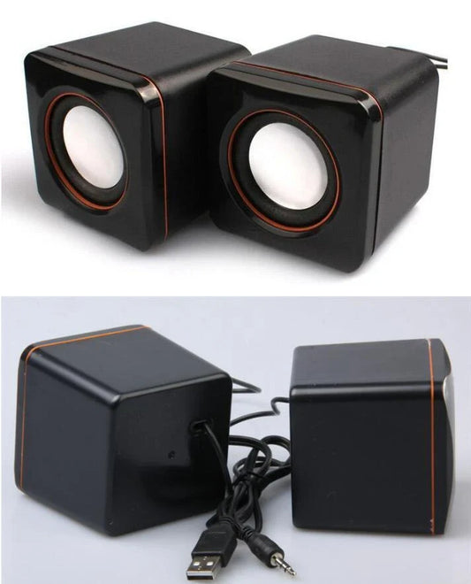 Compact USB-powered desktop speaker with sleek black design and volume control