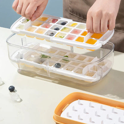 Quick demould ice cube tray set with storage box in yellow, blue, and pink