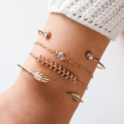 Adjustable geometric bracelet set with crystal and leaf motifs