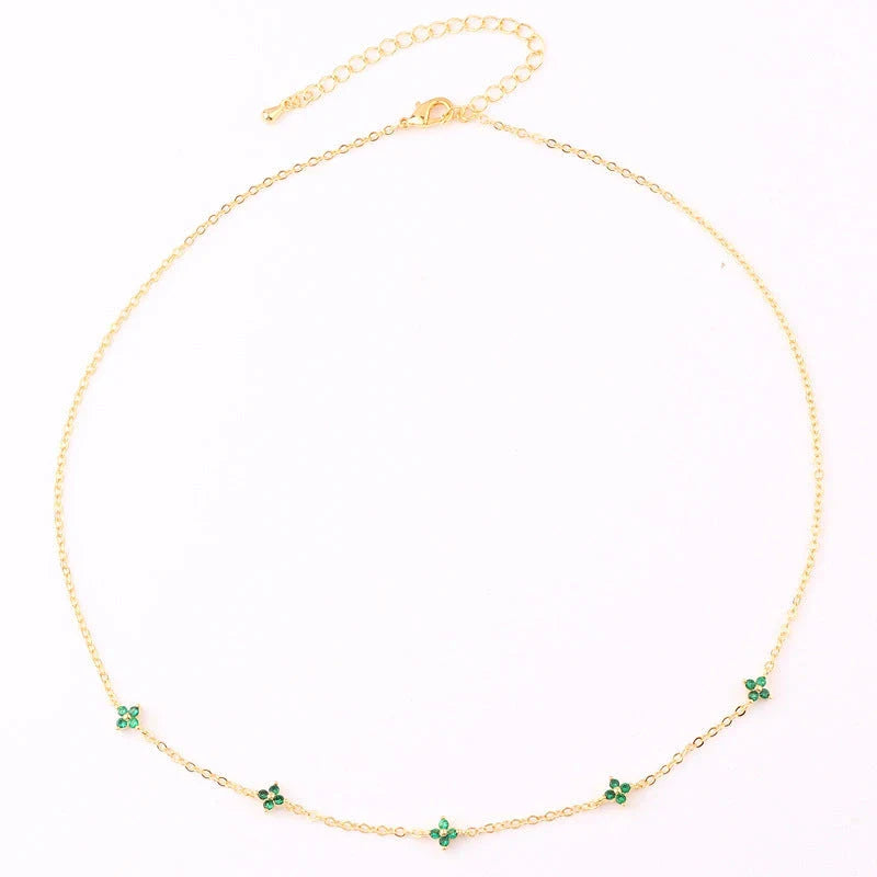 Elegant floral statement necklace in various color options, including golden blue, silver blue, golden green, and silver green, with an adjustable chain and high-quality construction.