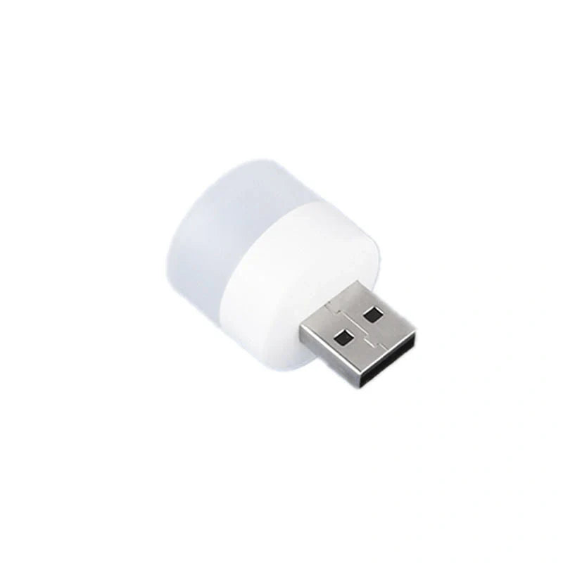Compact USB LED night light with soft glow for reading and sleep