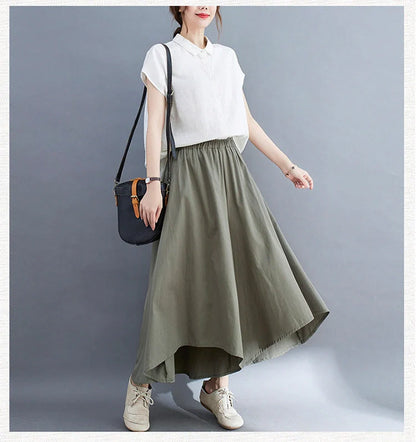 Stylish ladies' loose cropped trousers in various colours, including black, light green, blue, and apricot