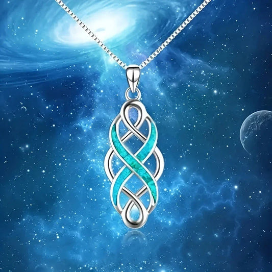 Elegant blue Celtic knot pendant necklace with ellipse and ring design, showcasing the rich cultural heritage of Ireland