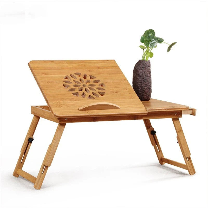 Ergonomic bamboo laptop desk with storage drawers, adjustable legs, and cooling fan for comfortable home office use