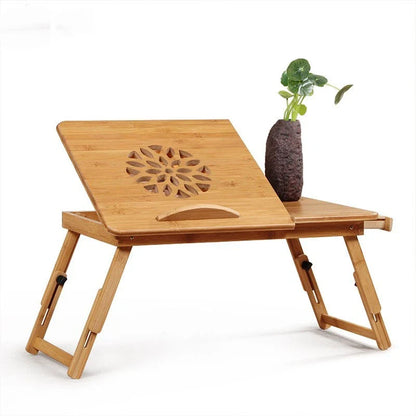 Ergonomic bamboo laptop desk with storage drawers, adjustable legs, and cooling fan for comfortable home office use