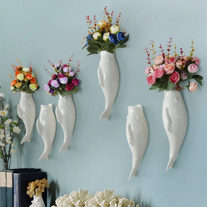 Modern ceramic goldfish vase wall hanging in white, three-dimensional design