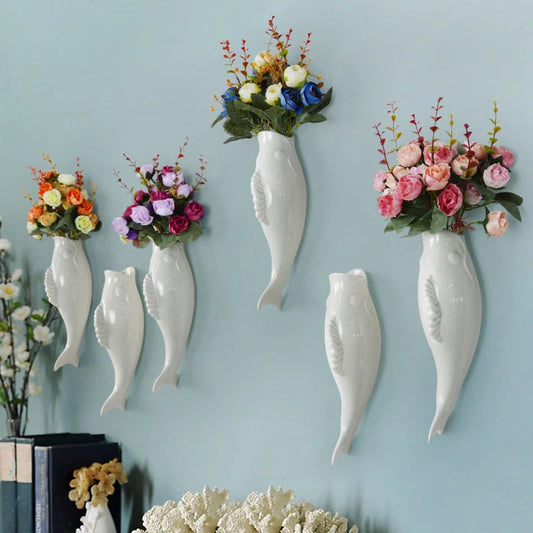 Modern ceramic goldfish vase wall hanging in white, three-dimensional design