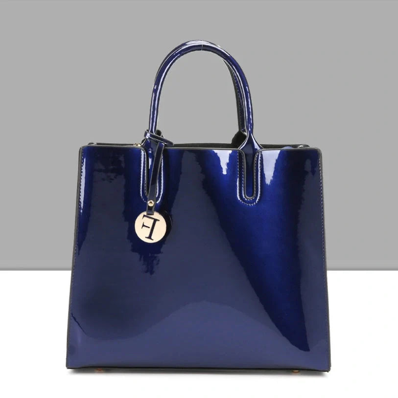 3 sets of leather handbags in various colors with zipper closure and cell phone pocket