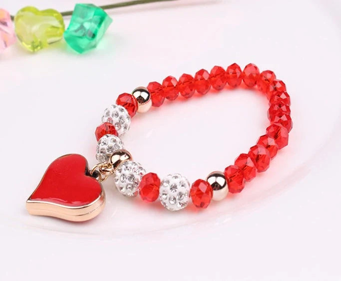 Elegant crystal heart-shaped bracelets in various vibrant colours, perfect for adding a touch of sophistication to any outfit