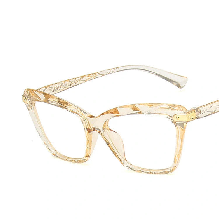 Women's anti-blue light cat eye glasses in transparent pink, bright black, transparent grey, and transparent tea