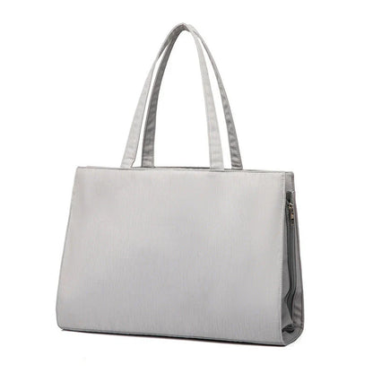 A premium quality mother and baby bag made from soft, durable Oxford cloth with a large 20-35L capacity, versatile backpack or shoulder bag design, and customisable interior pockets.