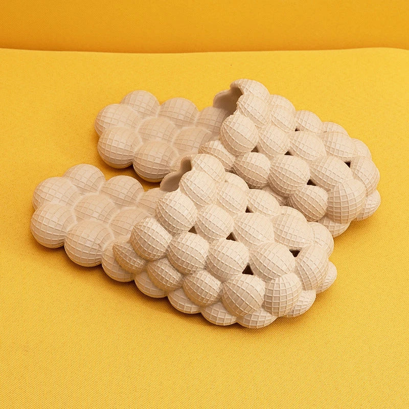 Comfortable massage bubble slides with breathable mesh upper and non-slip soles for indoor relaxation and pampering