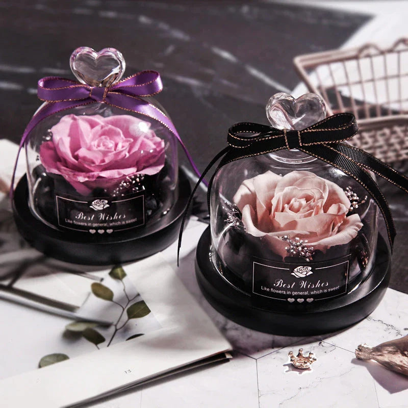 Enchanting Eternal Rose with LED lighting in a glass display, showcasing its timeless beauty and elegant design