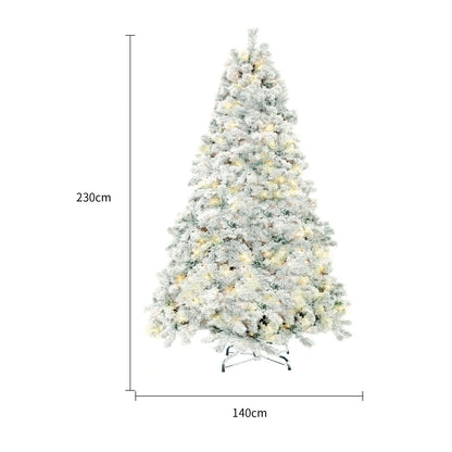 Premium artificial Christmas tree with realistic snow-like accents, providing a captivating winter wonderland effect for your holiday decor