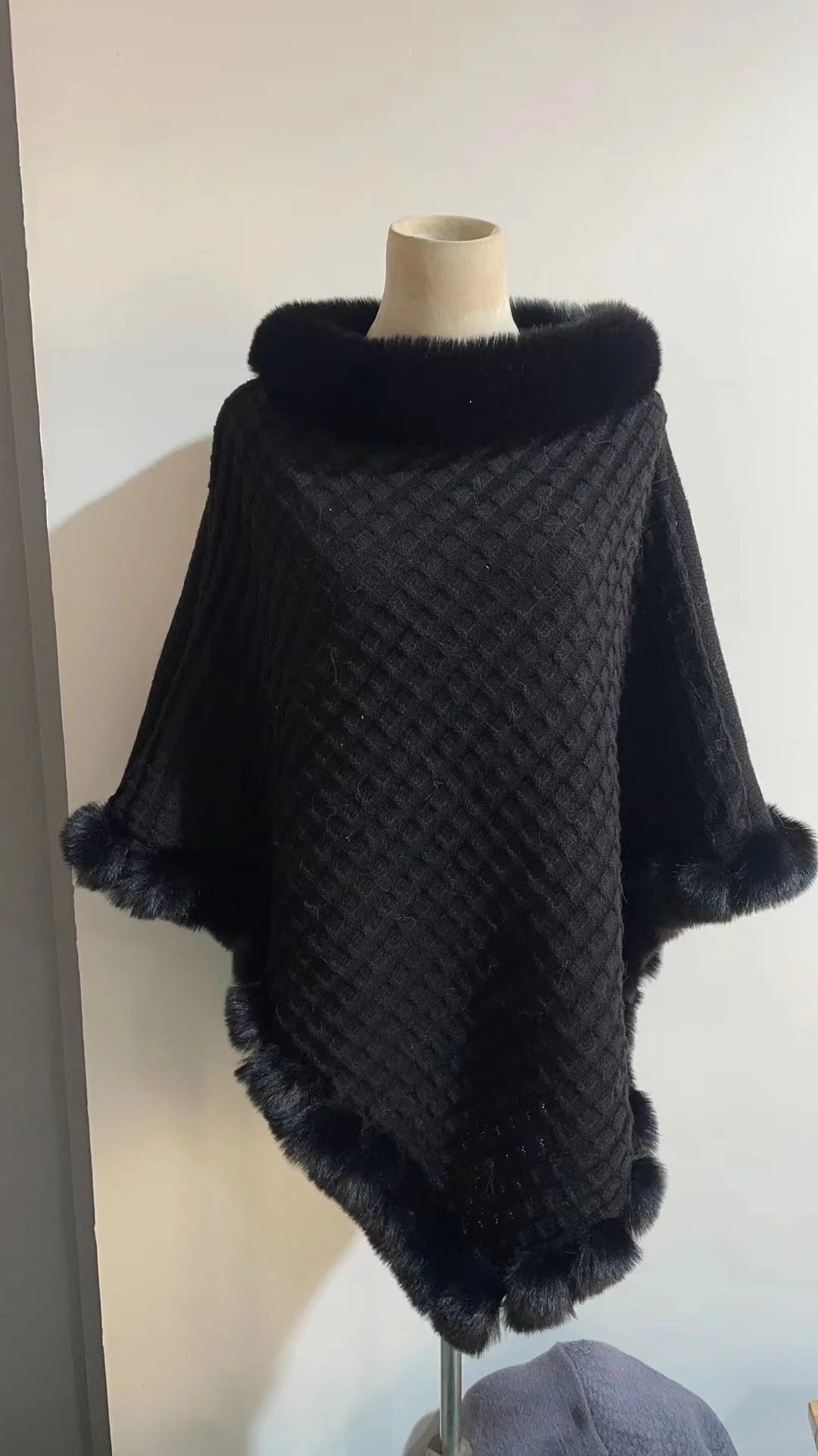 Luxurious rabbit fur wrap shawl in various colours, featuring a soft, cosy collar and a flattering cropped fit for a chic, polished look.