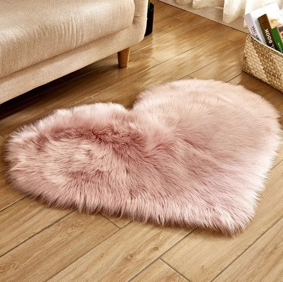Luxury heart-shaped plush carpet in various colours and sizes, featuring a soft, non-slip design for comfortable home decor