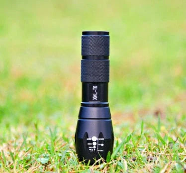 High-powered outdoor LED flashlight with adjustable beam and durable aluminum alloy construction