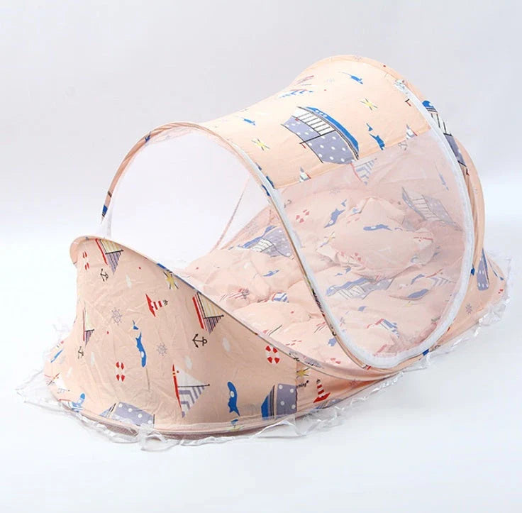 Foldable baby mosquito net bed with soft mattress and pillows, providing a safe and comfortable sleeping environment for infants and toddlers.