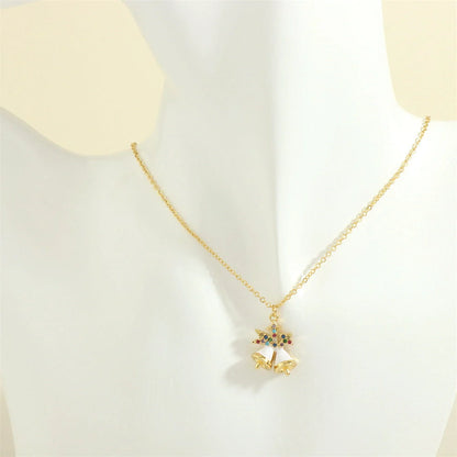 Festive Christmas-themed necklace with oil-drop pendant and coloured rhinestones