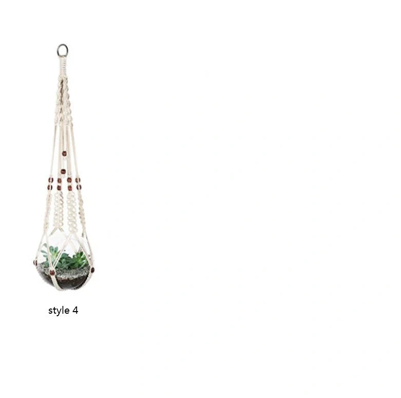 Handmade bohemian macrame hanging plant baskets in a set of four, perfect for home decor.