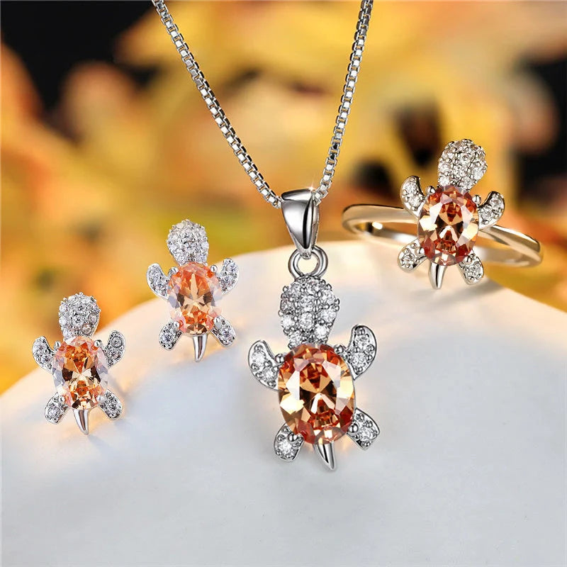 Stylish turtle pendant necklace with vibrant rainbow stones, perfect for women and children.
