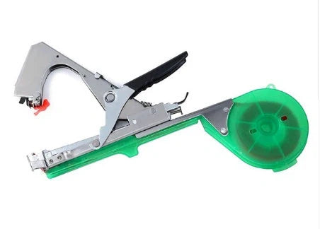 Compact garden hand tool for tying plant stems with plastic tape, measuring 300x200x100mm