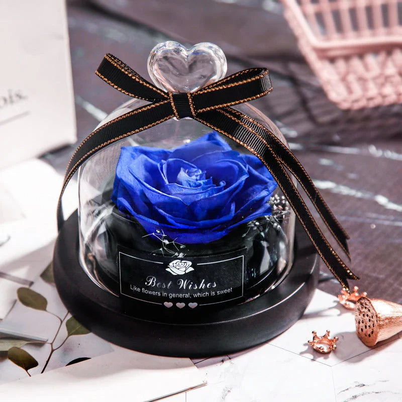 Enchanting Eternal Rose with LED lighting in a glass display, showcasing its timeless beauty and elegant design