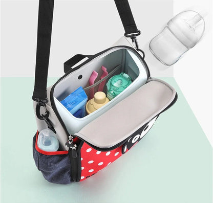 Multifunctional baby bag with portable child dining chair in yellow, perfect for parents travelling with babies