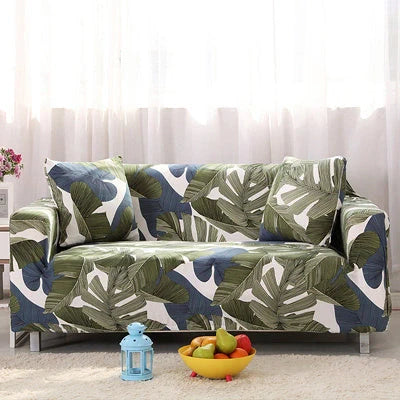 Stretchable geometric print sofa cover on a three-seater sofa