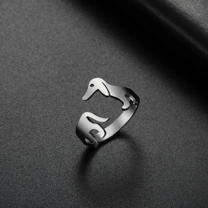 Adjustable titanium steel ring featuring a playful sausage dog design