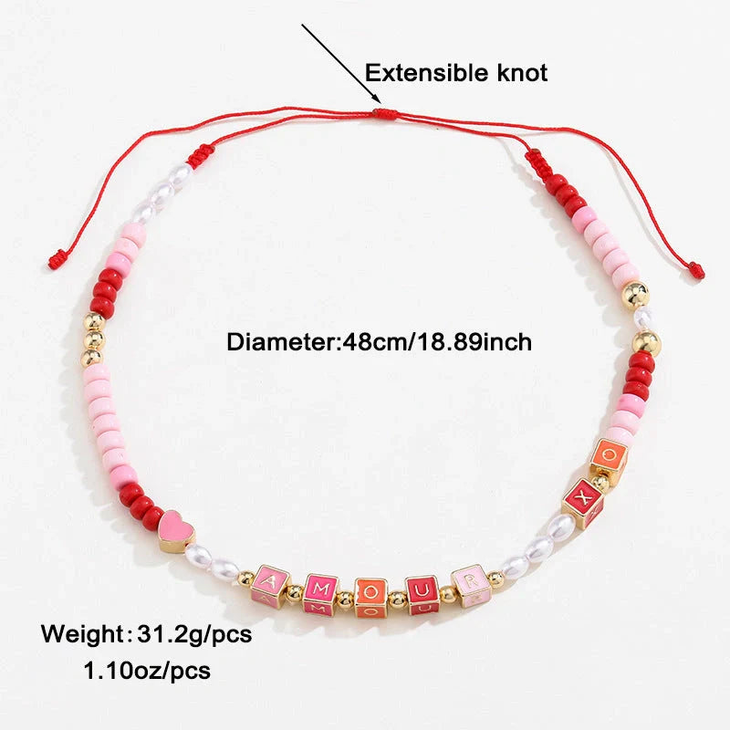Elegant necklace and bracelet set with delicate beads and English letter charms, crafted with premium alloy materials