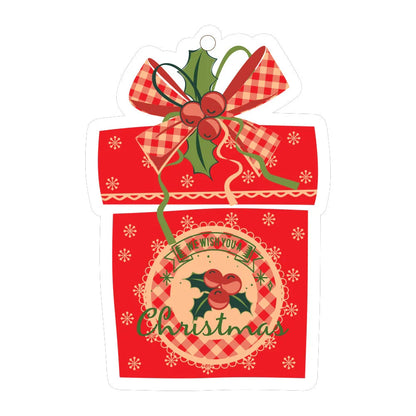 Festive car ornament hanging from rearview mirror with Christmas designs