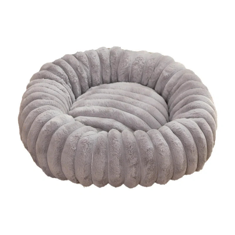 Plush round pet kennel for dogs, available in multiple colours and sizes for winter comfort