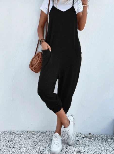 Sleeveless sling jumpsuit in various colours, showcasing versatile design and loose-fitting silhouette