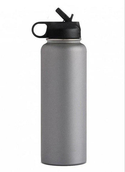 Premium stainless steel insulated tumbler with push-button lid and sleek design for outdoor adventures and active lifestyles.