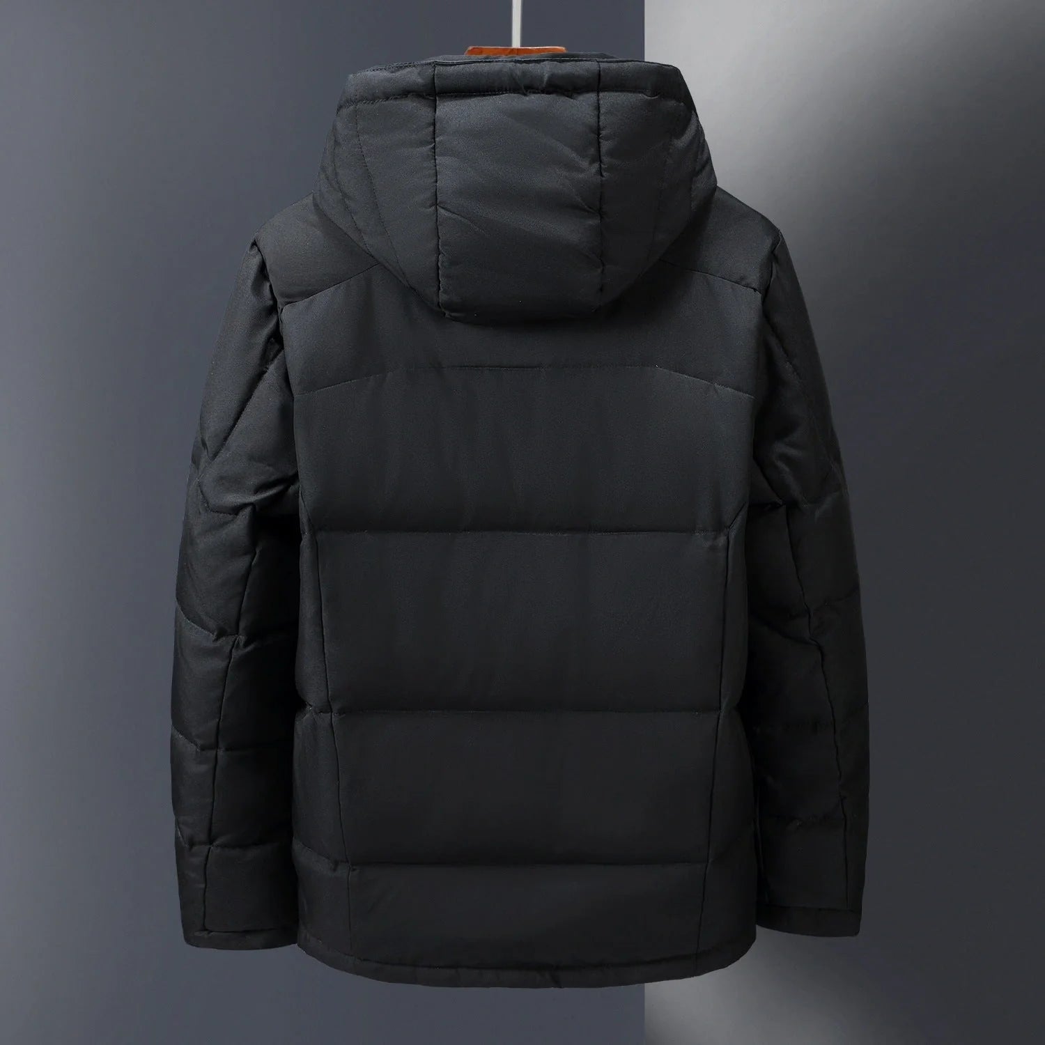 A cosy, hooded windbreaker jacket in a variety of classic colours, designed for outdoor adventures in the United Kingdom.