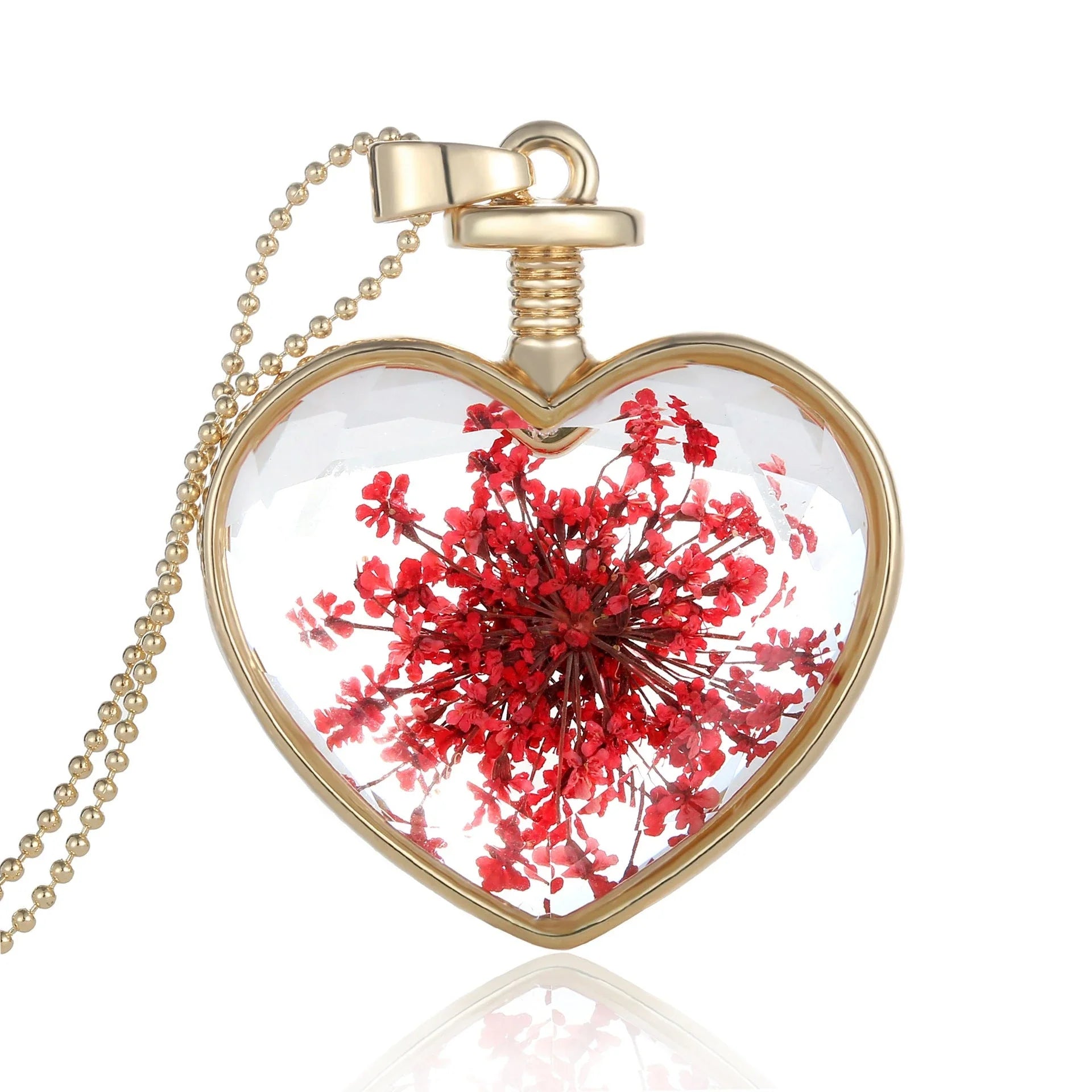 Elegant glass-encased dried flower pendant necklace with bead chain, showcasing a variety of preserved floral arrangements.