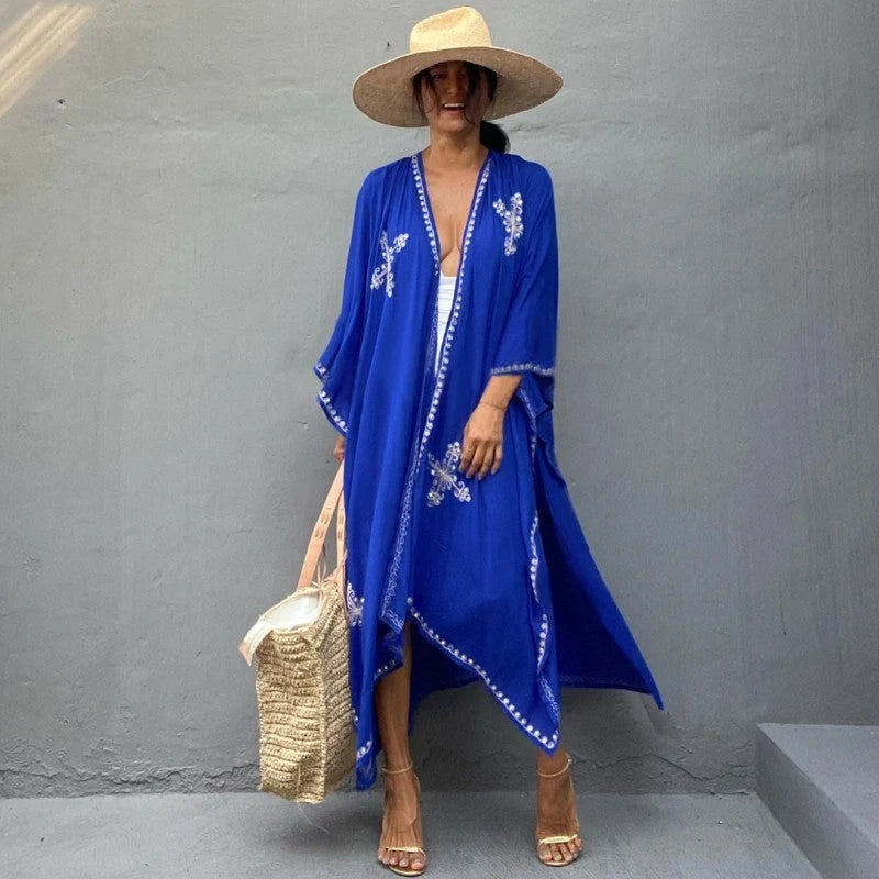 Fashionable rayon beach cardigan with vibrant embroidered design, offering sun protection and versatile style for coastal holidays