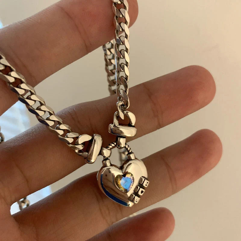 Heart Sweater Necklace in Thai silver with geometric heart design