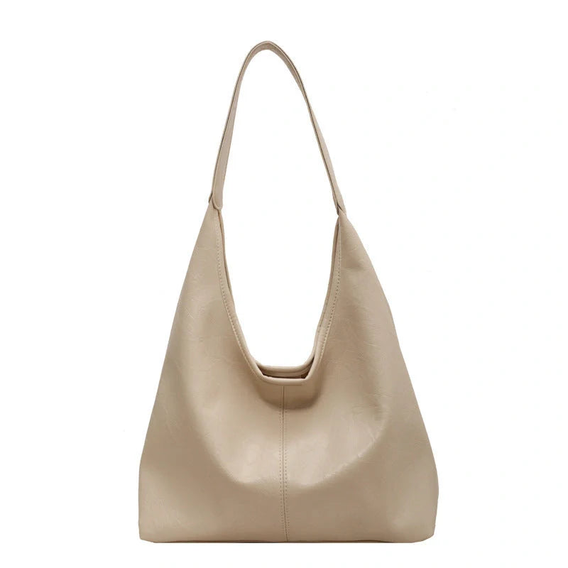 Elegant vintage designer women's shoulder bag in various colours