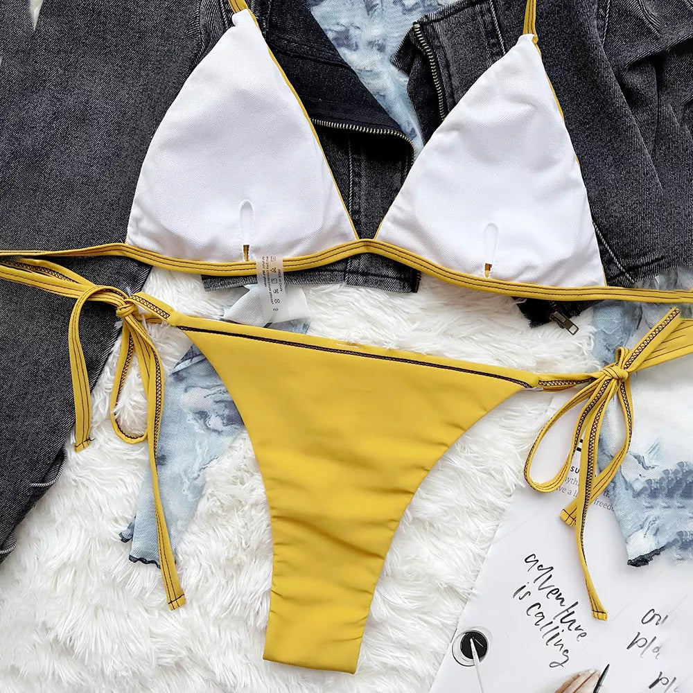 Women's yellow nylon triangle strap swimsuit with adjustable straps for a custom fit