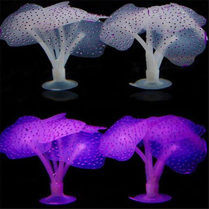 Artificial blue silicone coral decorating an aquarium with lush underwater plants and vibrant fish