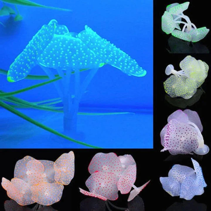 Artificial blue silicone coral decorating an aquarium with lush underwater plants and vibrant fish