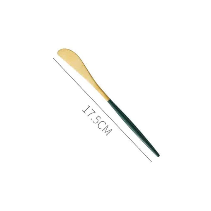 A set of minimalist, eco-friendly tableware in green and gold tones, including plates, bowls, and utensils.