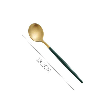 A set of minimalist, eco-friendly tableware in green and gold tones, including plates, bowls, and utensils.